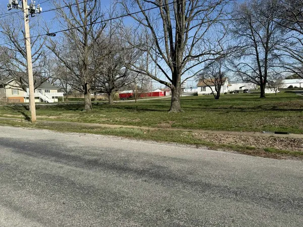 a view of road with trees