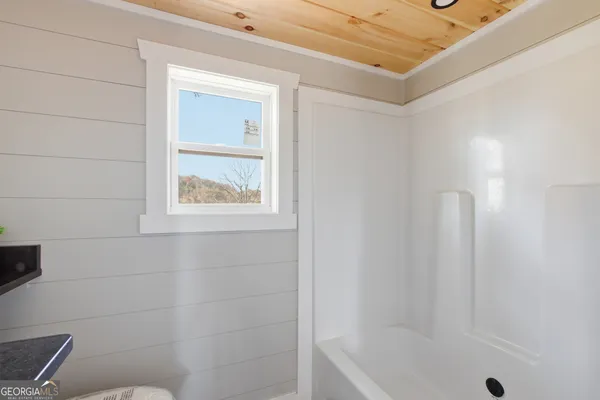 a bathroom with a bathtub