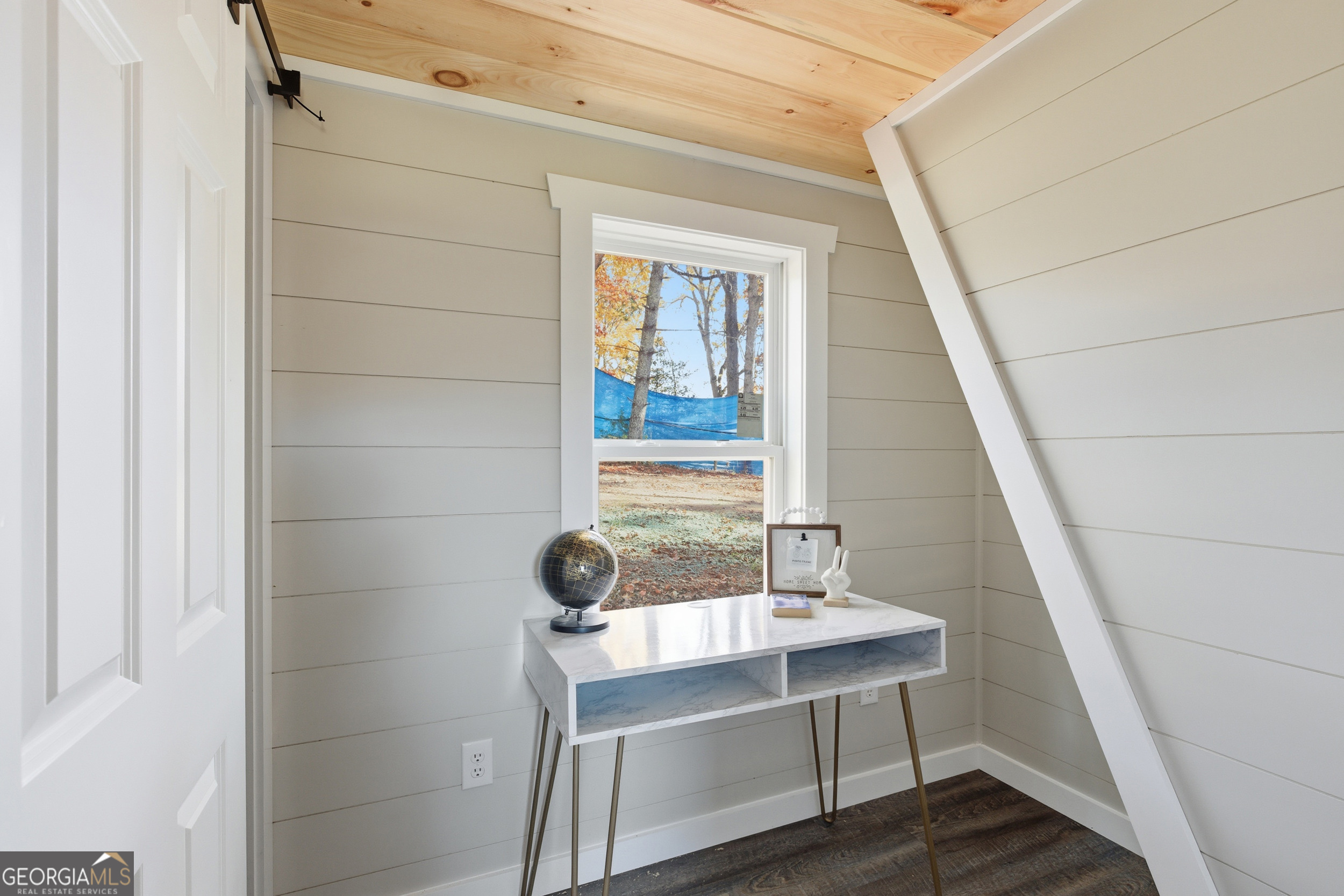 527 Saunders Road Franklin, NC 28734 - Photo 17 of 25 a bathroom with a sink and a mirror