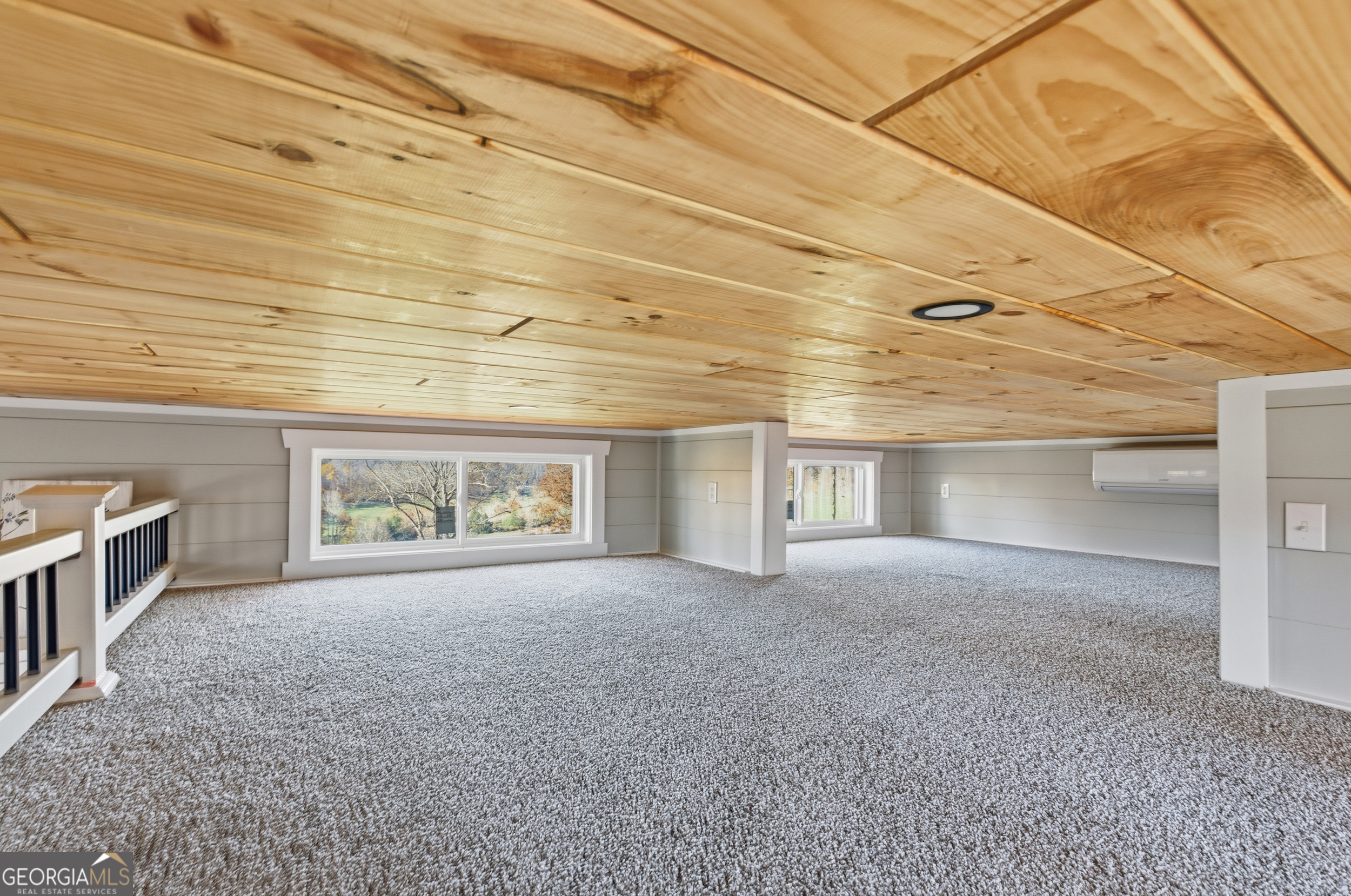 527 Saunders Road Franklin, NC 28734 - Photo 23 of 25 an empty room with windows