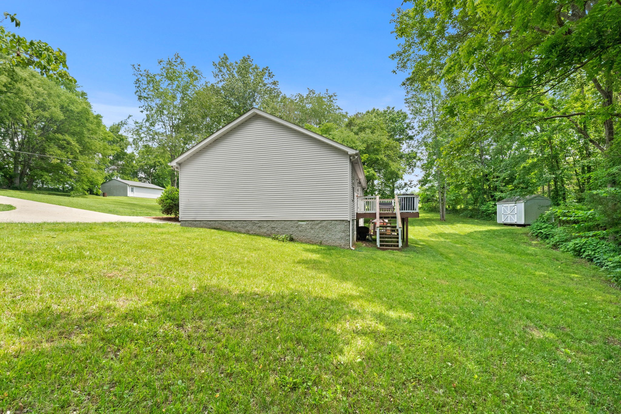 6446 Green Road Springfield, TN 37172 - Photo 27 of 33 a view of a house with backyard and garden