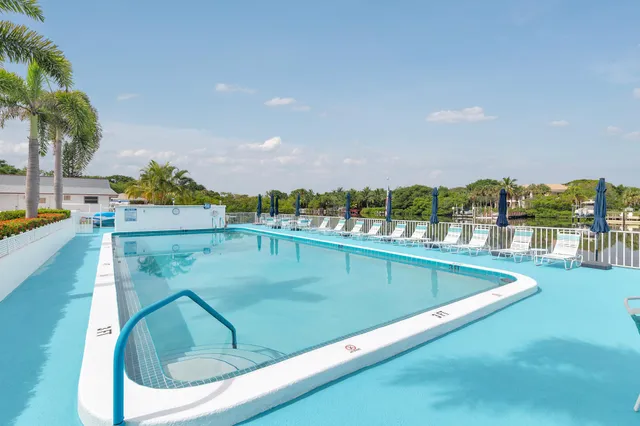 an aerial view of a city with lake view
