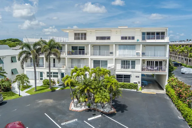 a house with a bench in front of it