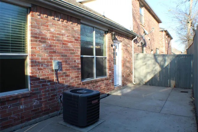 a front view of house with a garden