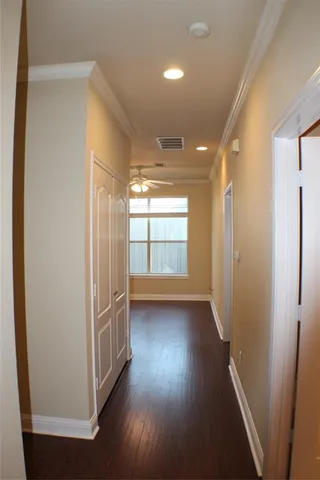 a view of entryway with wooden floor