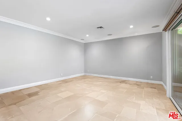 a bathroom with a granite countertop sink and a bathtub