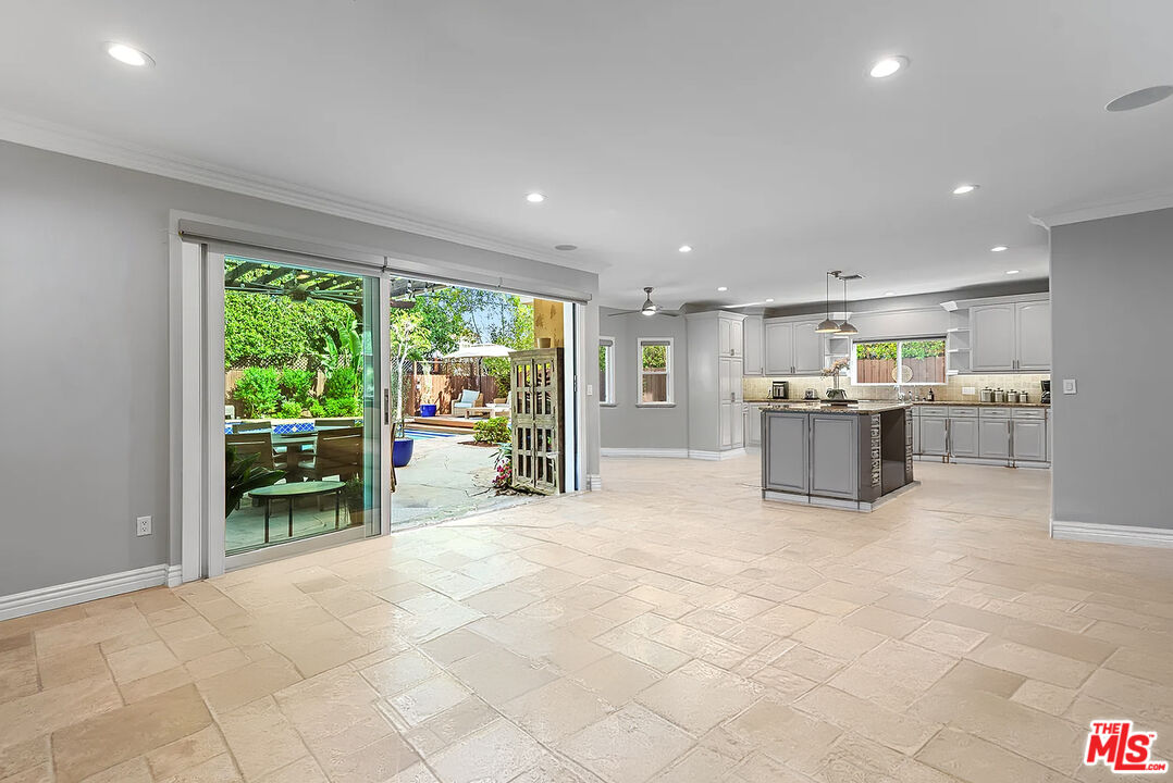 4724 Noble Avenue Sherman Oaks, CA 91403 - Photo 14 of 35 a view of kitchen with furniture and floor to ceiling window