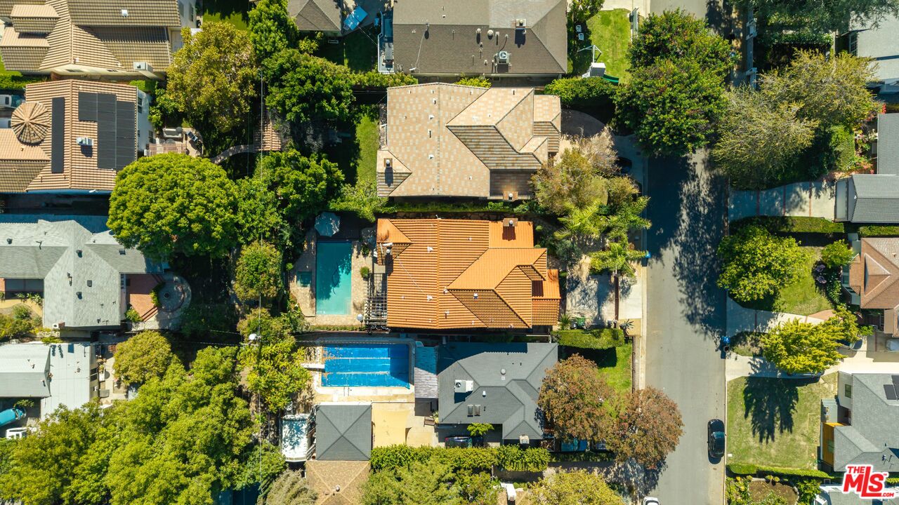 4724 Noble Avenue Sherman Oaks, CA 91403 - Photo 5 of 35 an aerial view of a house with a yard and garden