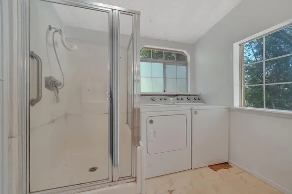 a view of walk in closet with window