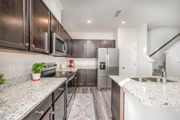 a view of a dining room with furniture