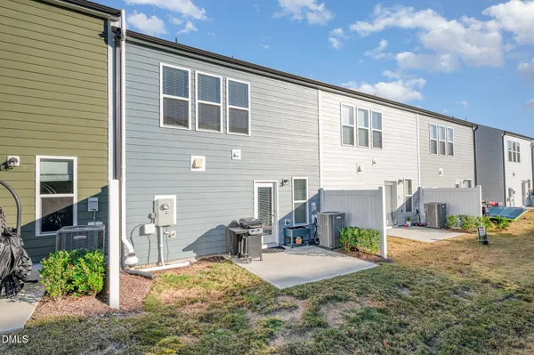 a bathroom with a shower and a glass door