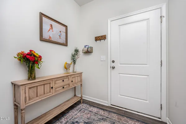 a picture of a bench in front of a building