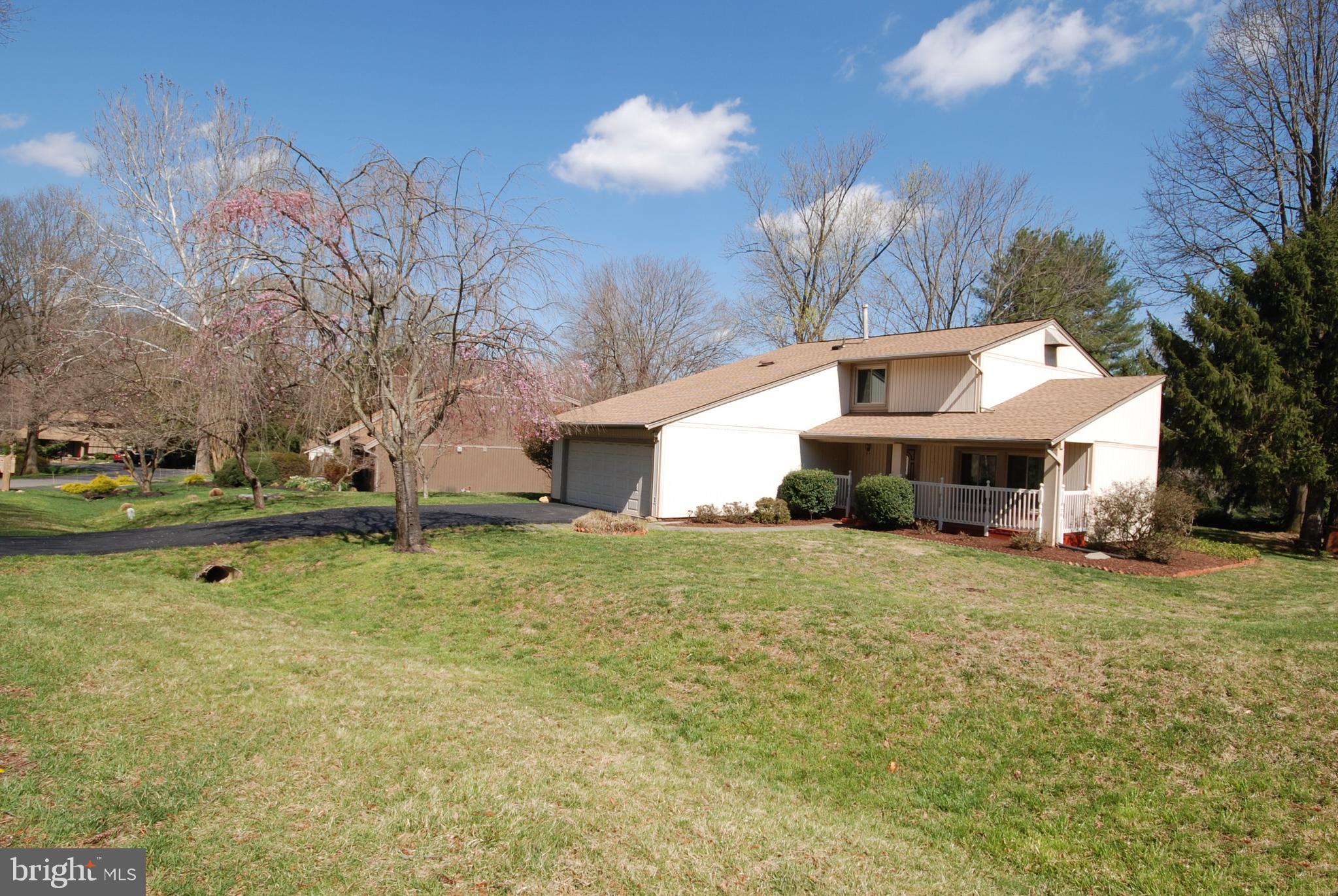 11609 Piney Lodge Road North Potomac, MD 20878 - Photo 3 of 25 a house view with a garden space