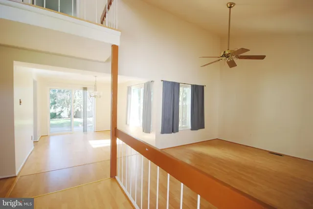 a view of a hallway with windows