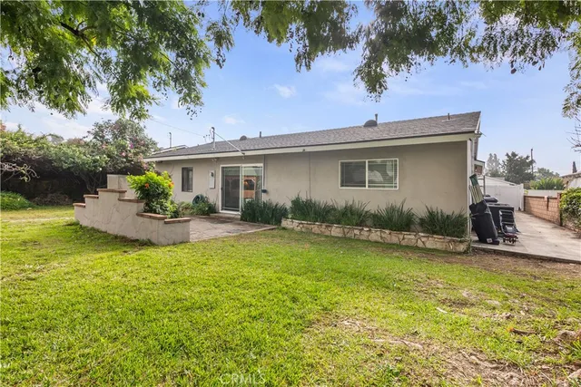 a house view with a garden space