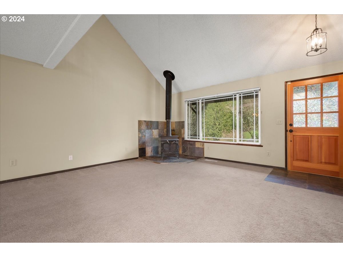 3506 Northwest 166th Street Ridgefield, WA 98642 - Photo 6 of 37 a view of empty room with floor to ceiling window