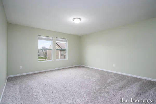 $300,000 | 11611 Kodiak Court Southeast, Alto, MI 49302