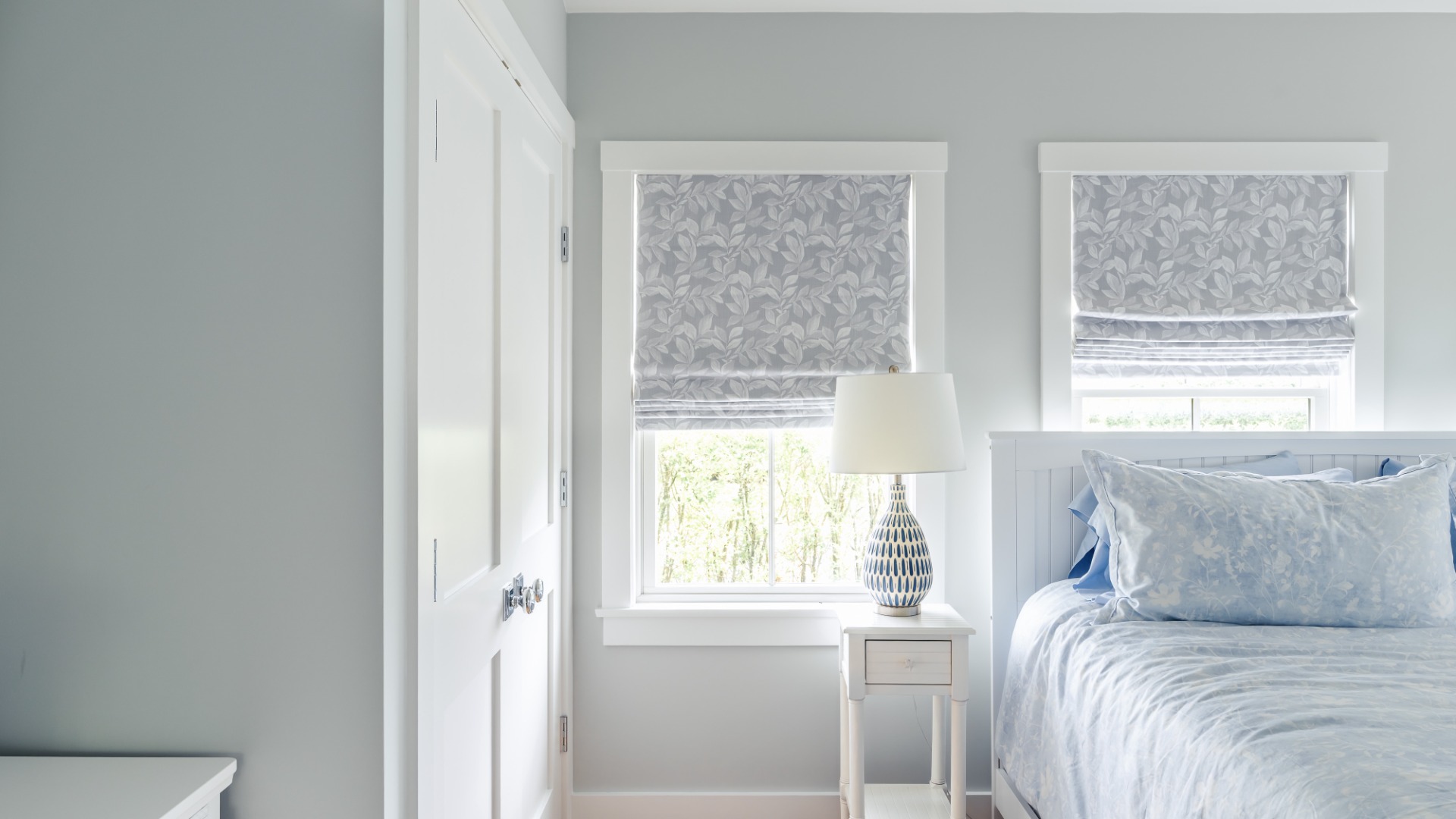 86 Cliff Road Nantucket, MA 02554 - Photo 8 of 29 a bed sitting in a bedroom next to a window