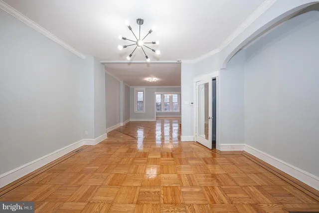 a kitchen with stainless steel appliances a refrigerator sink and cabinets