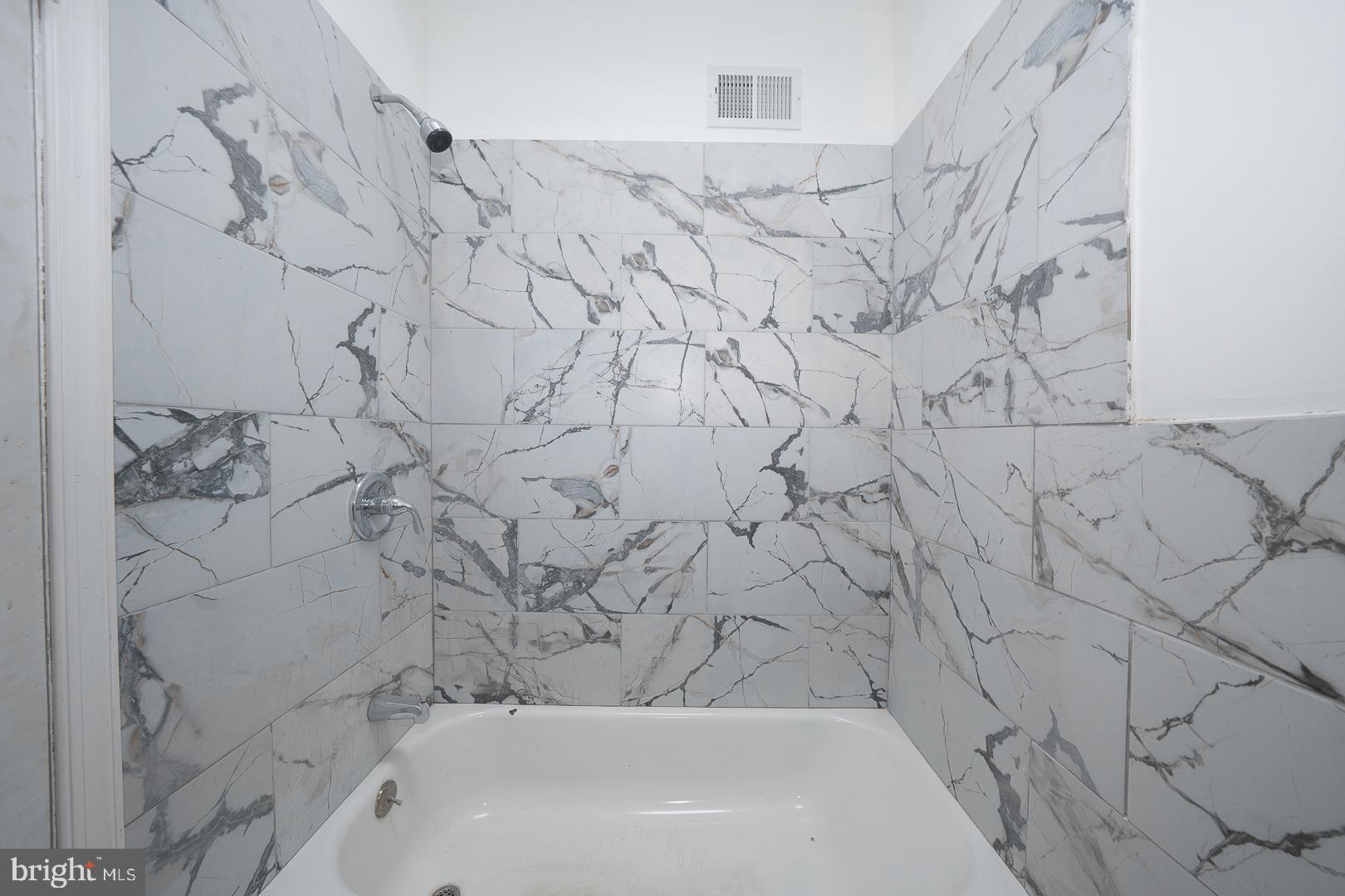 212 Copley Road Upper Darby, PA 19082 - Photo 37 of 69 a bathroom with a bathtub