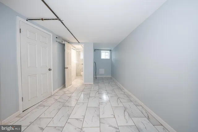 a front view of a building with windows