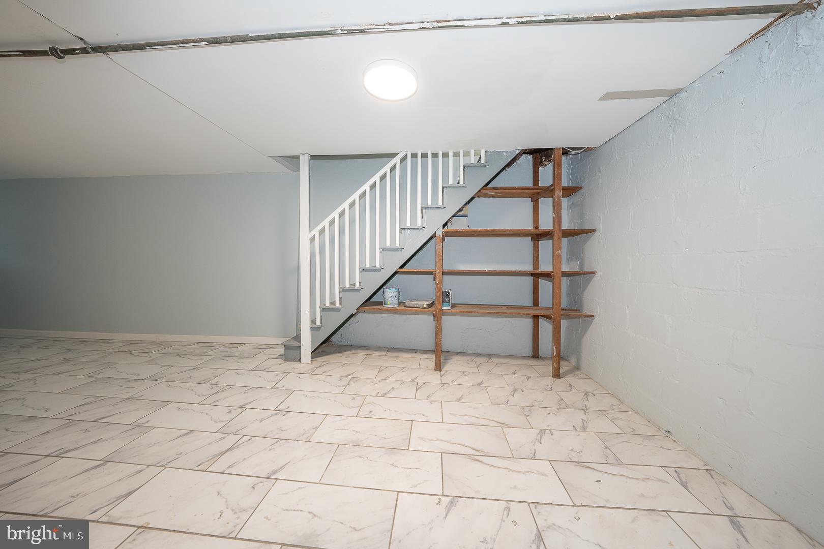 212 Copley Road Upper Darby, PA 19082 - Photo 56 of 69 a view of an empty room with stairs