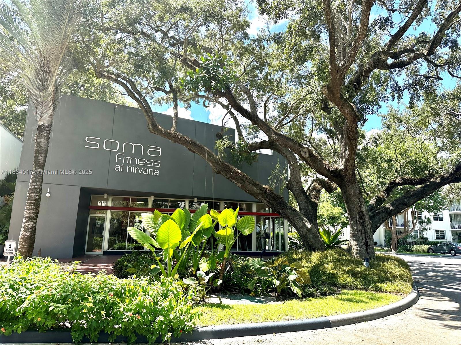 680 Northeast 64th Street, Unit A501 Miami, FL 33138 - Photo 20 of 30 a view of a sign in a yard