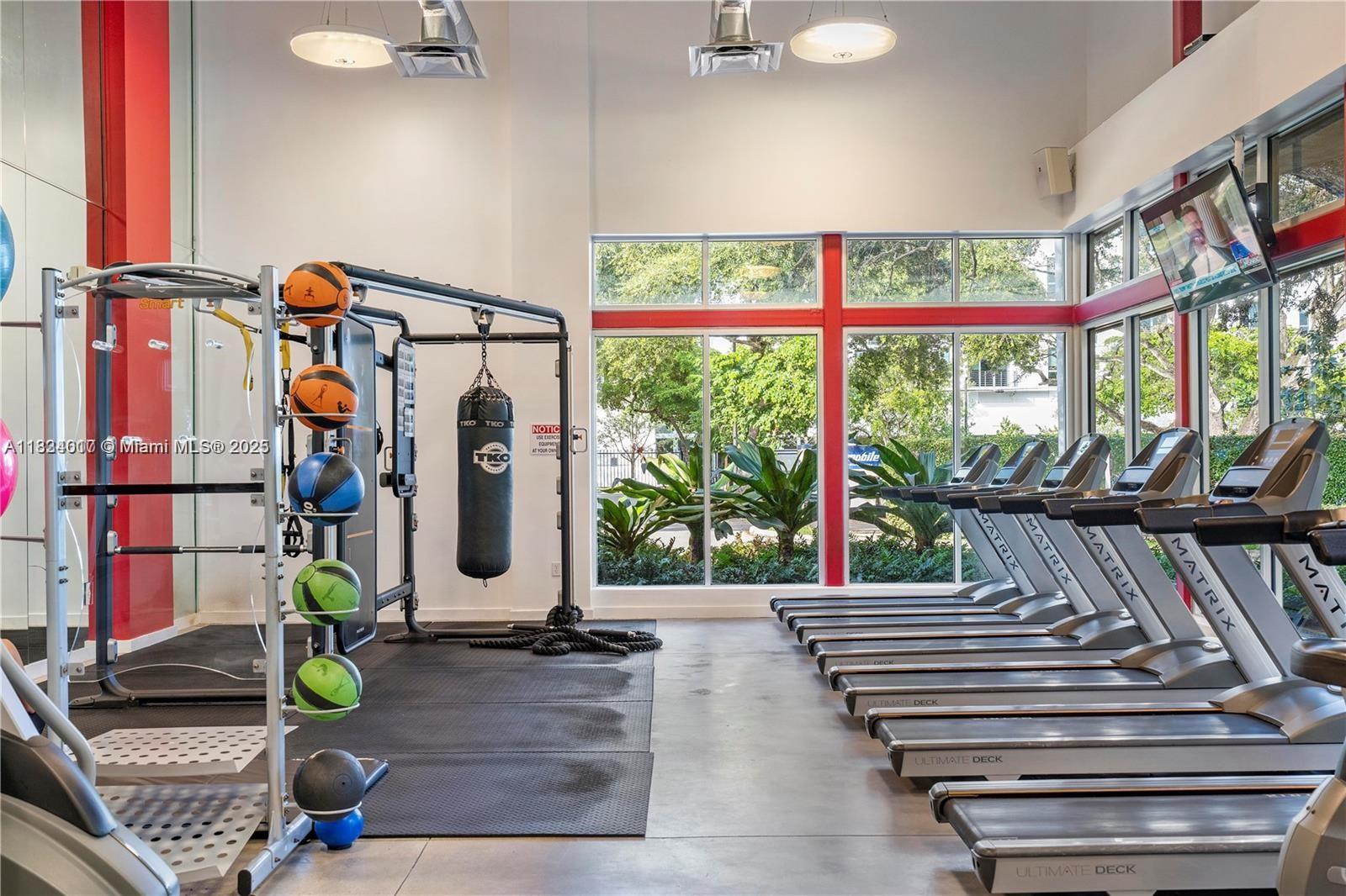 680 Northeast 64th Street, Unit A501 Miami, FL 33138 - Photo 22 of 30 a view of entryway with wooden floor
