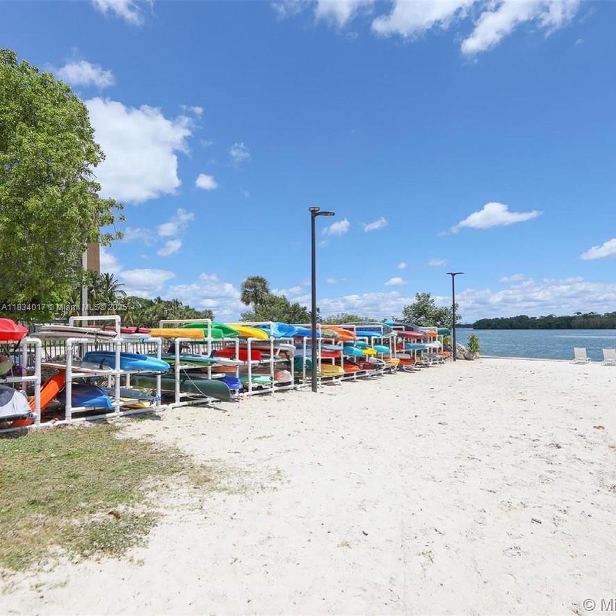 680 Northeast 64th Street, Unit A501 Miami, FL 33138 - Photo 25 of 30 a view of a lake with a building