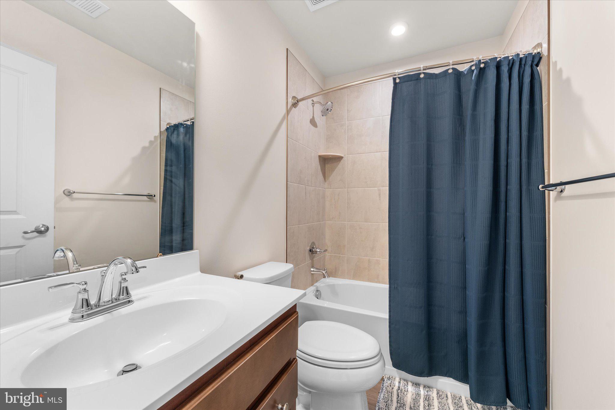 1776 Scenic Loop Culpeper, VA 22701 - Photo 28 of 36 a bathroom with a sink toilet and shower