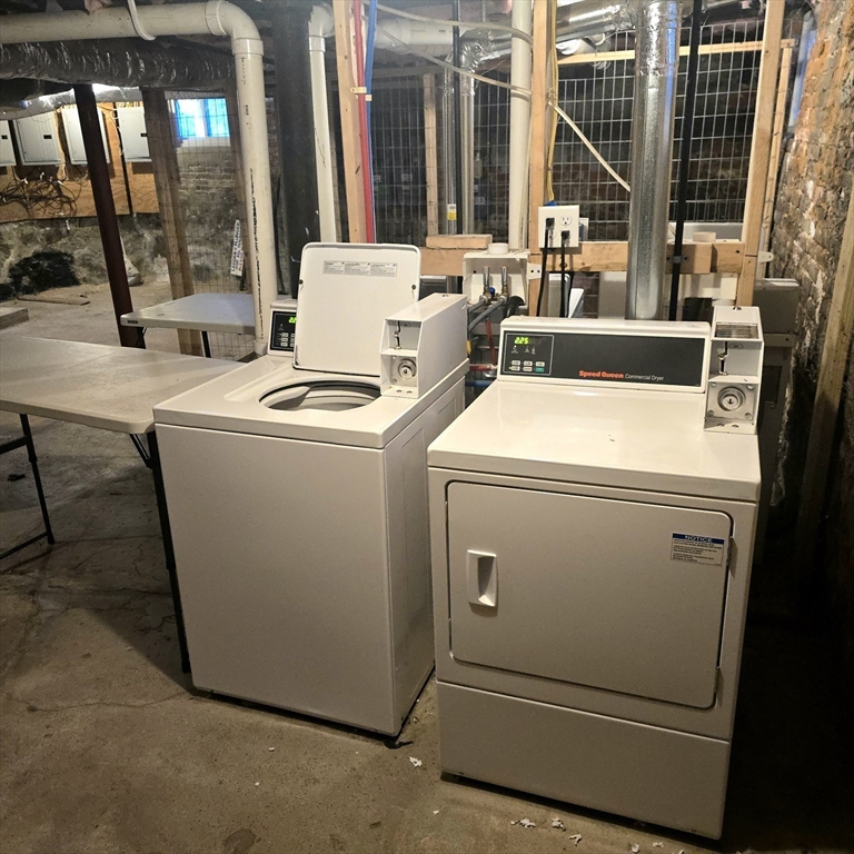 94 Morrison Avenue, Unit 3 Somerville, MA 02144 - Photo 8 of 12 a view of washer and dryer with washer and dryer