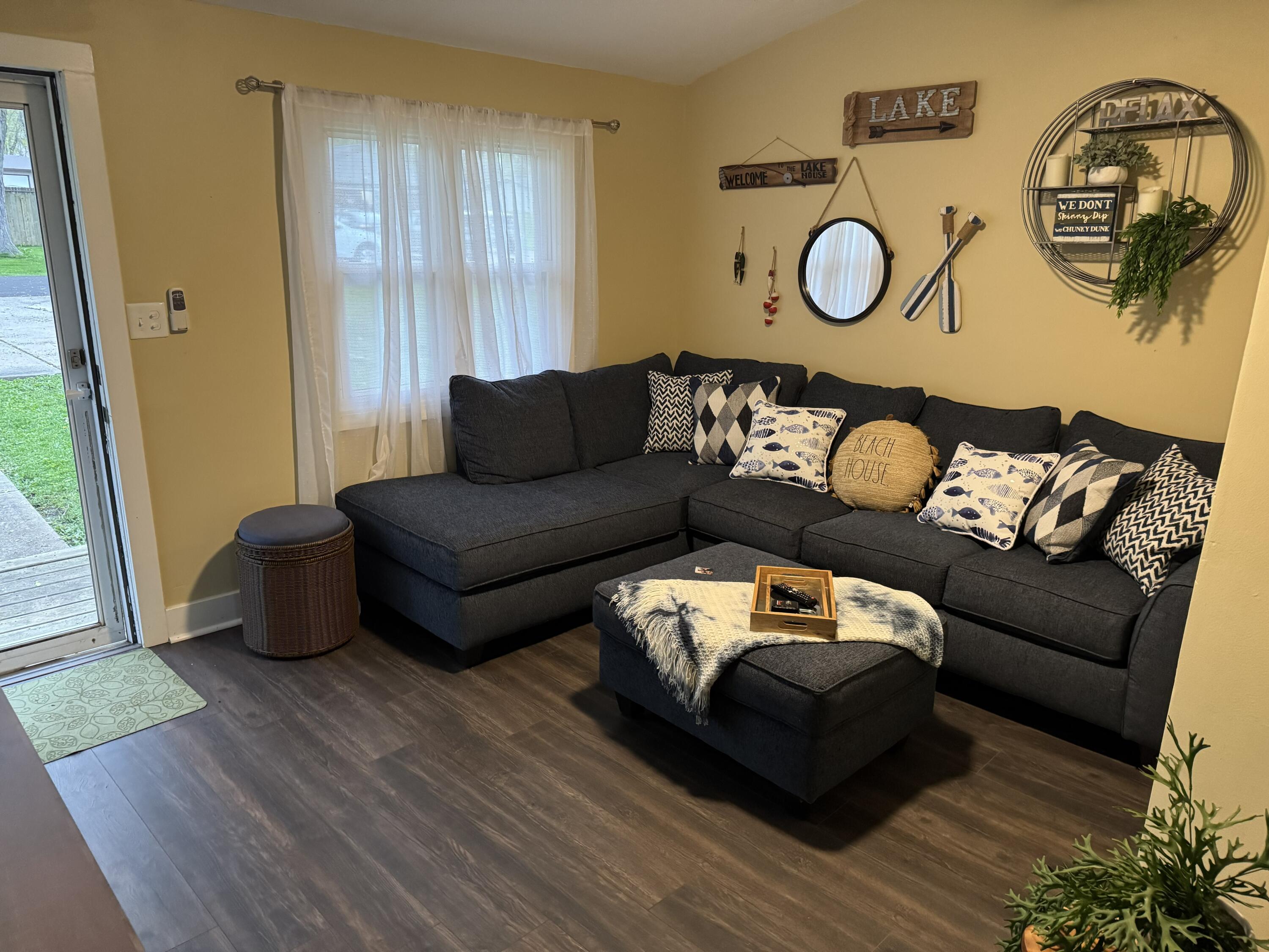 N6212 West Lake Shore Drive Spring Prairie, WI 53105 - Photo 7 of 16 Living room, angle 2