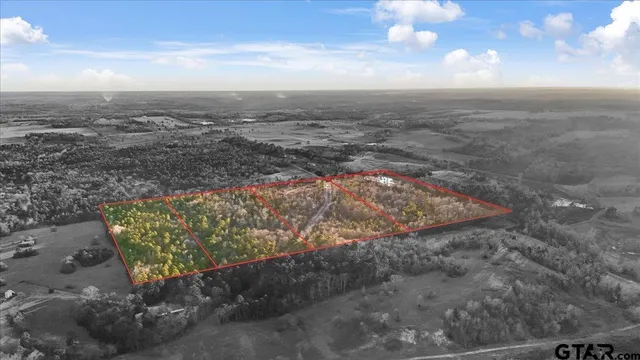 a view of a yard with an outdoor space