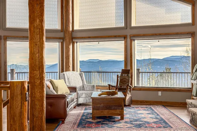 a kitchen with stainless steel appliances granite countertop a stove and large wooden cabinets