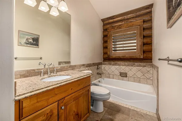 a bed room with a bed and a large closet