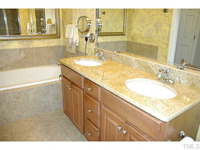 2305 St Paul's Square Raleigh, NC 27614 - Photo 15 of 25 Relax int he garden tub. Nice finishes in this main floor master bath. Master Bedroom