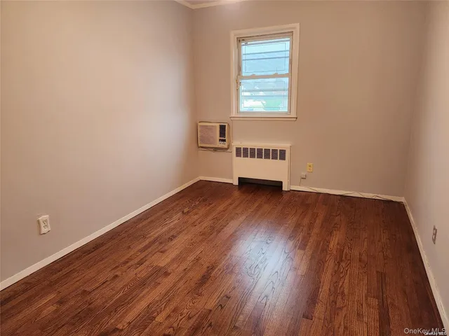 a bathroom with a granite countertop sink a toilet a bathtub and shower