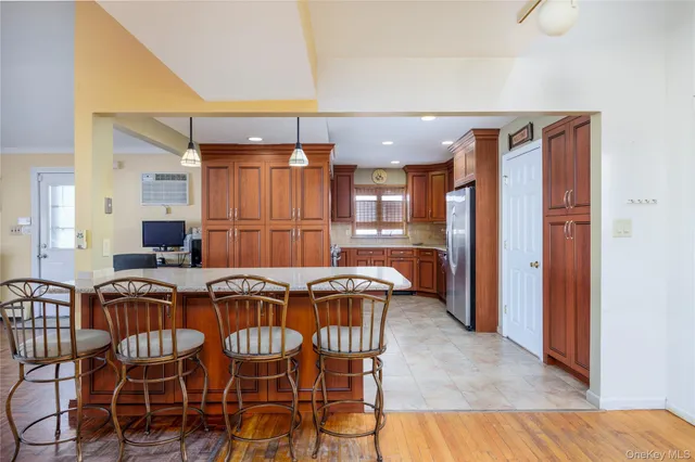 a kitchen with a table and chairs
