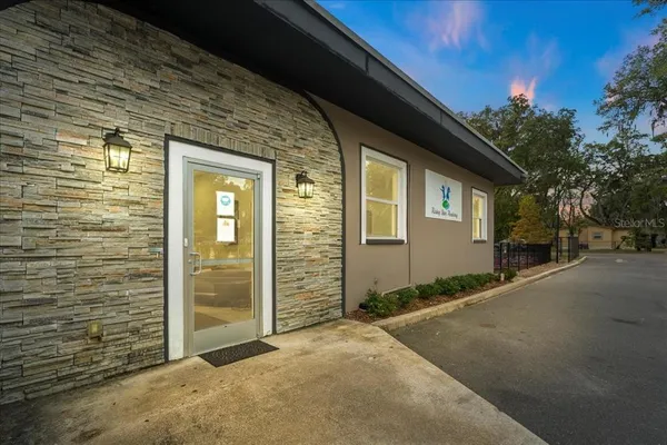 a view of a hallway with a outdoor space