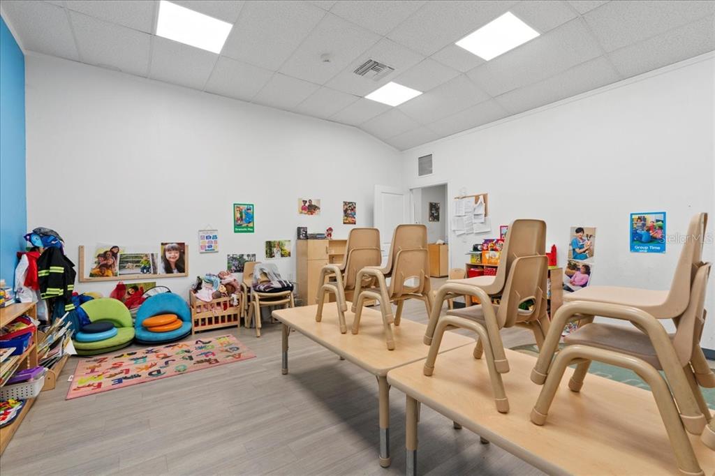 1938 Northeast Waldo Road Gainesville, FL 32609 - Photo 13 of 64 a very nice looking room with a table and chairs