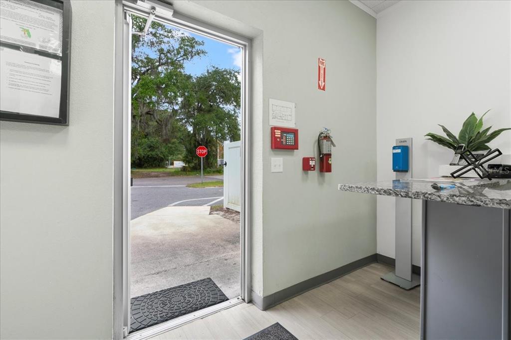 1938 Northeast Waldo Road Gainesville, FL 32609 - Photo 2 of 64 a view of a hallway with a outdoor space