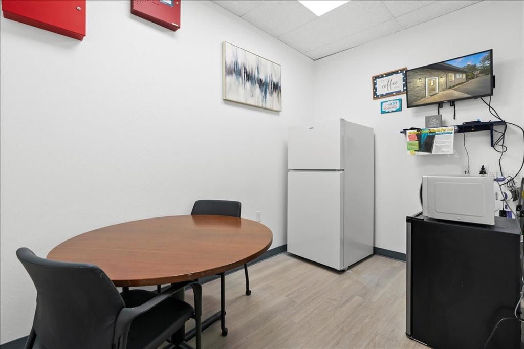 1938 Northeast Waldo Road Gainesville, FL 32609 - Photo 25 of 64 a view of a dining room with furniture