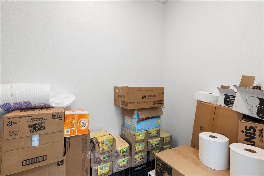 1938 Northeast Waldo Road Gainesville, FL 32609 - Photo 27 of 64 a utility room with dryer and washer