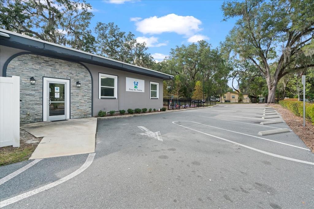 1938 Northeast Waldo Road Gainesville, FL 32609 - Photo 42 of 64 a view of a house with a backyard