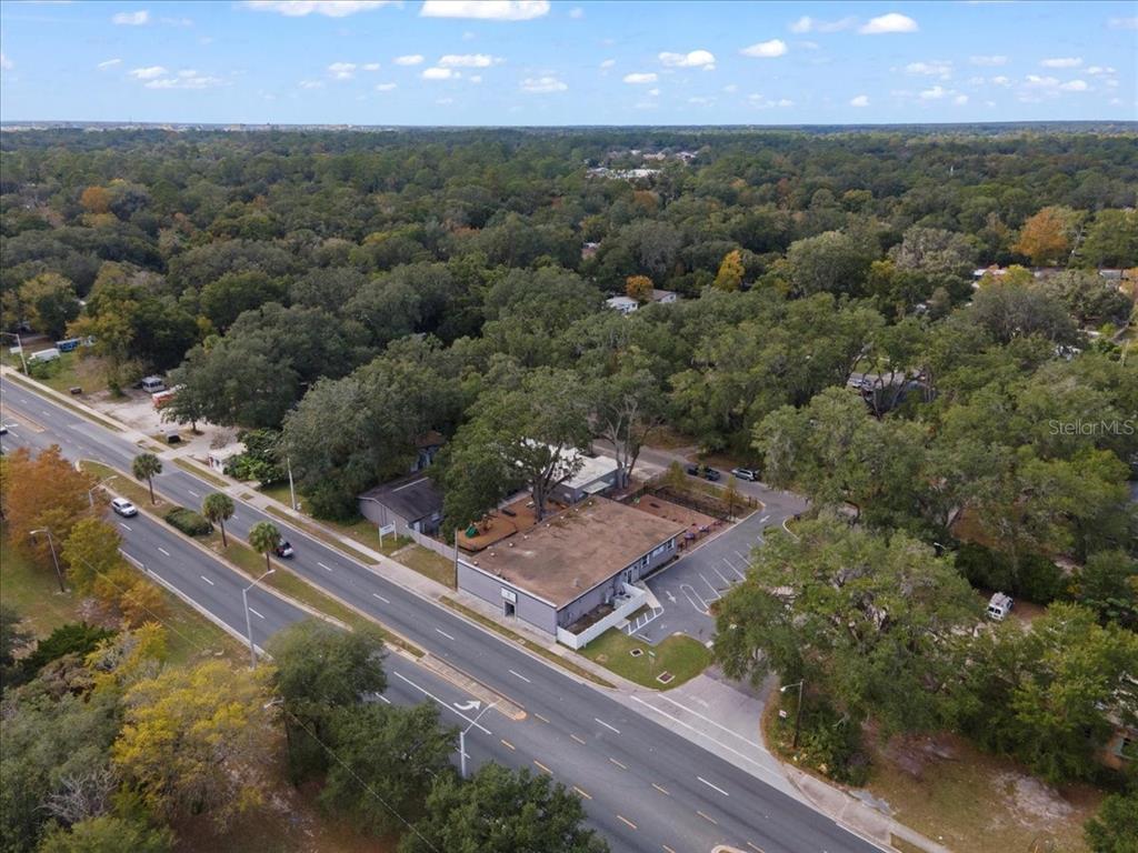 1938 Northeast Waldo Road Gainesville, FL 32609 - Photo 52 of 64 an aerial view of residential houses with outdoor space and city view