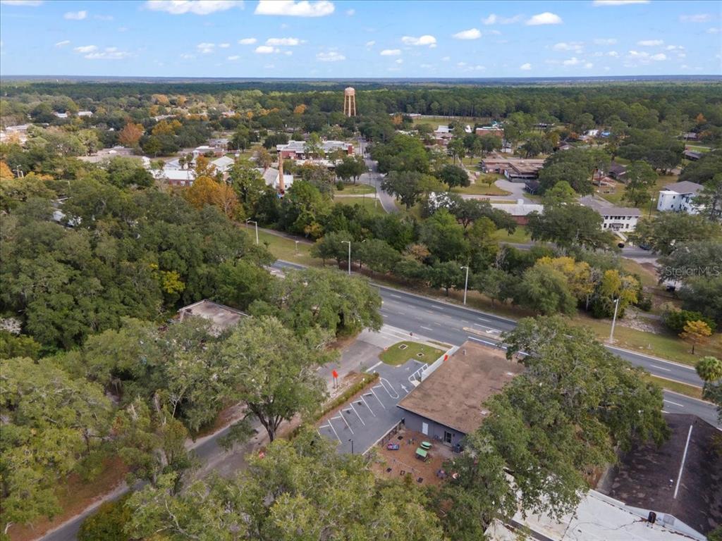 1938 Northeast Waldo Road Gainesville, FL 32609 - Photo 53 of 64 an aerial view of a house with a yard