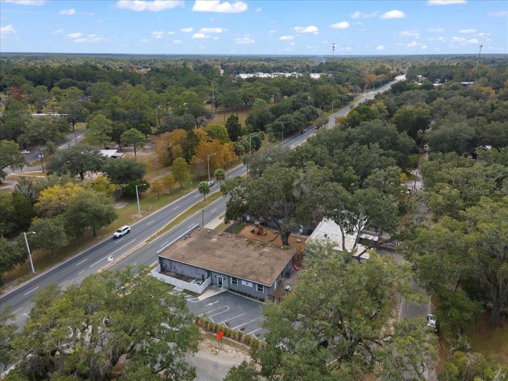1938 Northeast Waldo Road Gainesville, FL 32609 - Photo 54 of 64 an aerial view of a house with a yard