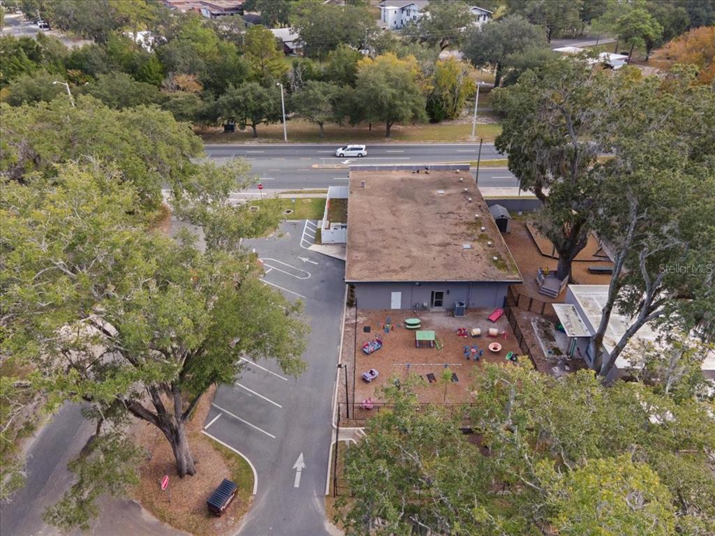 1938 Northeast Waldo Road Gainesville, FL 32609 - Photo 60 of 64 an aerial view of a house with yard and green space