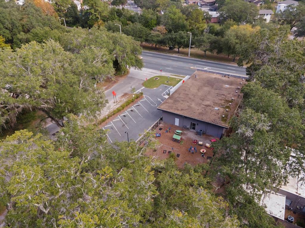 1938 Northeast Waldo Road Gainesville, FL 32609 - Photo 61 of 64 an aerial view of a house with a yard