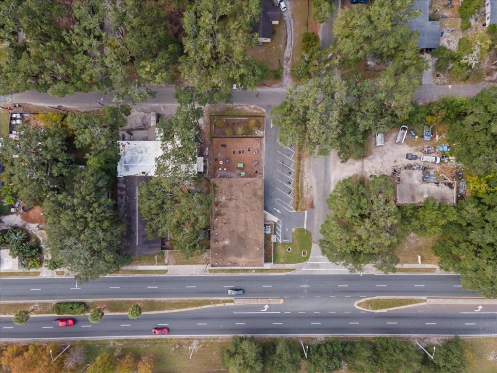 1938 Northeast Waldo Road Gainesville, FL 32609 - Photo 62 of 64 front view of a house with a yard